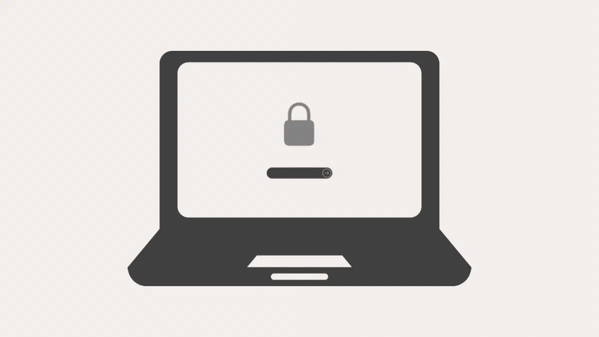 MacBook acceso sulla schermata di accesso con la rotella di caricamento